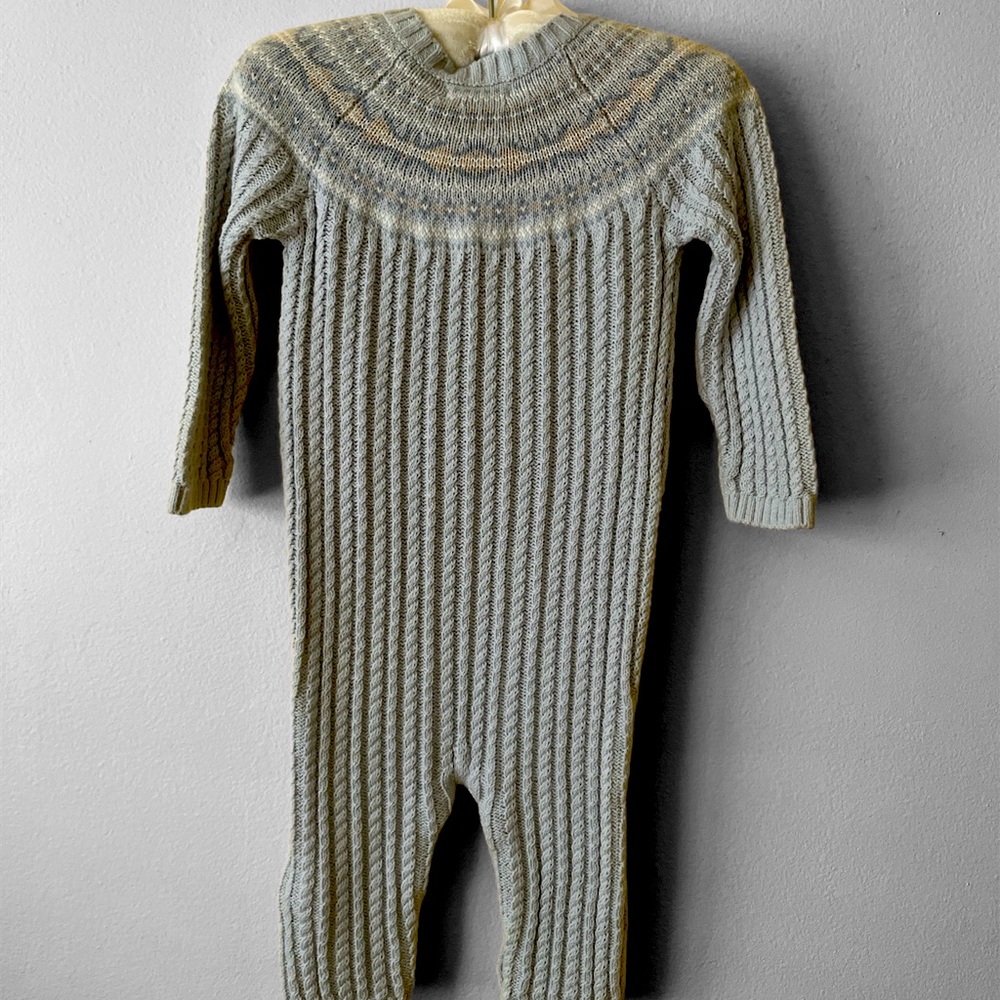 Welcome this beautifully crafted Tahari suit, with matching cap, for your baby!